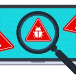 Biểu tượng cảnh báo và phát hiện phần mềm độc hại trên màn hình máy tính xách tay, minh họa nguy cơ an ninh mạng.