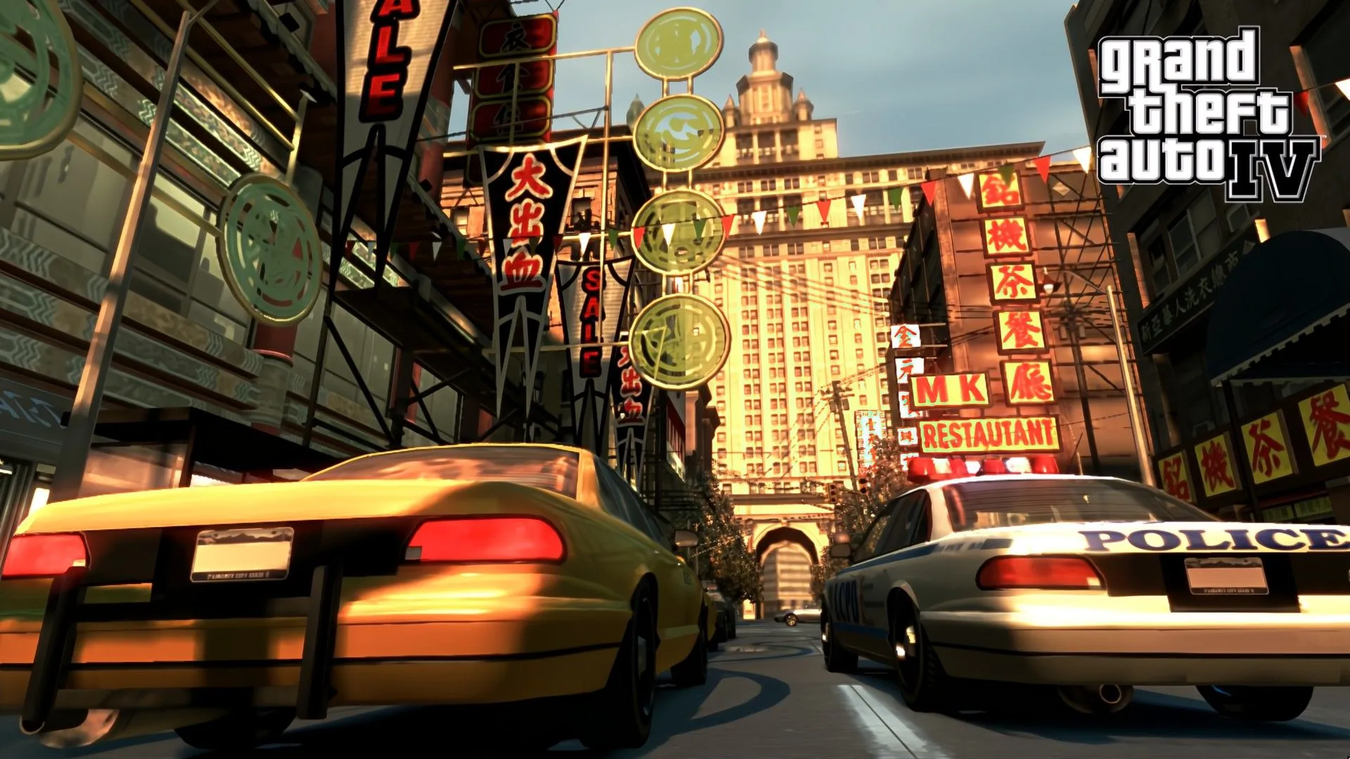 Chiếc taxi và xe cảnh sát trong Grand Theft Auto IV tại Liberty City, một trong những tựa game Rockstar được fan mong chờ remake.