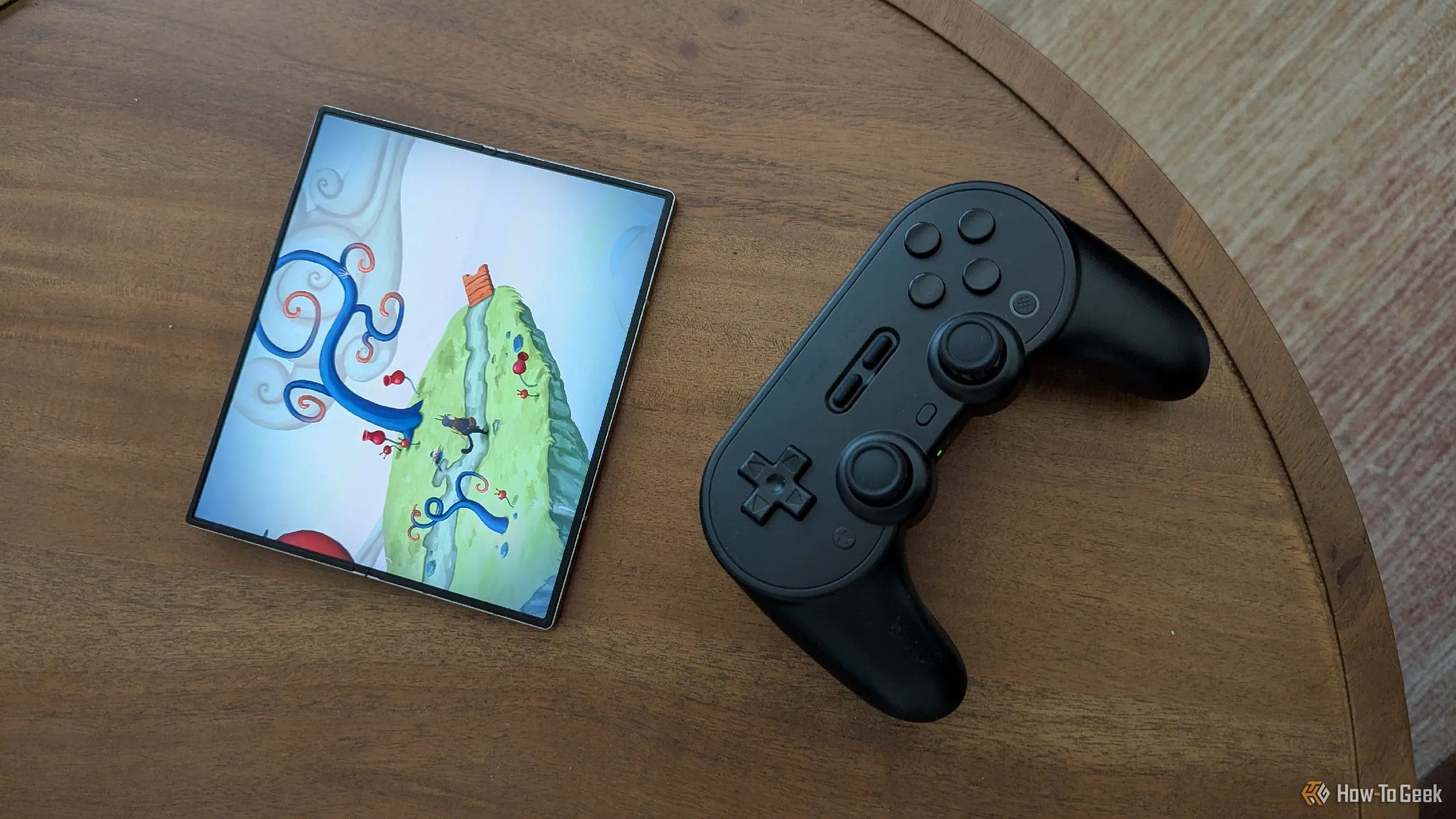 Game Figment đang chạy trên điện thoại Samsung Galaxy Z Fold 6 cùng tay cầm chơi game Bluetooth 8BitDo Pro 2