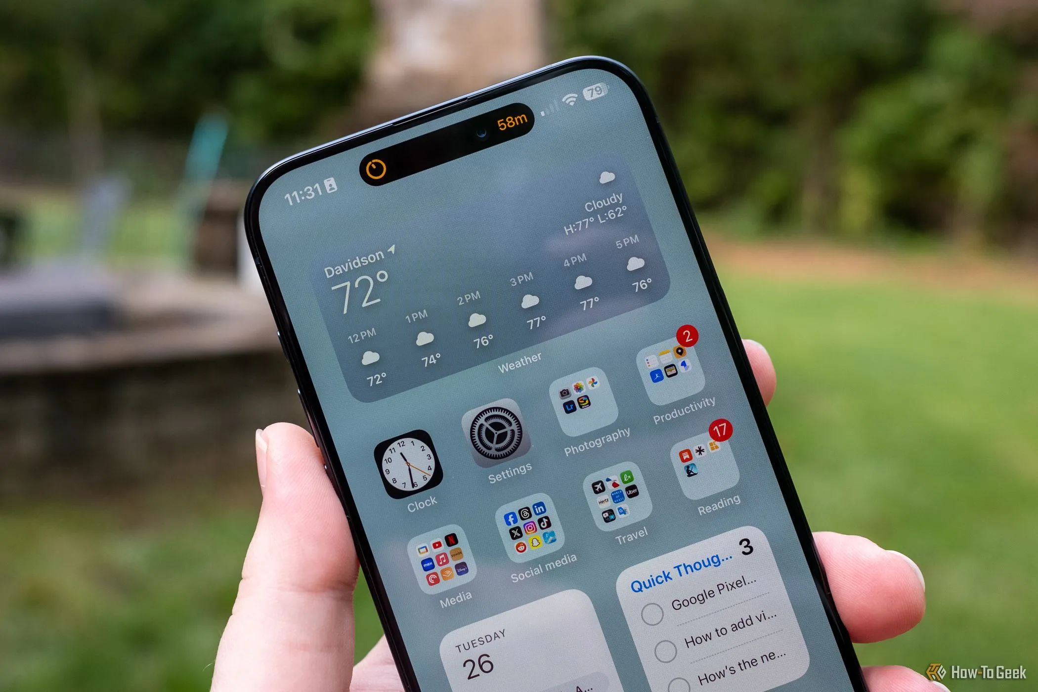 Giao diện Dynamic Island đang hiển thị bộ hẹn giờ trên iPhone 15 Pro Max, minh họa tính năng đa nhiệm linh hoạt.