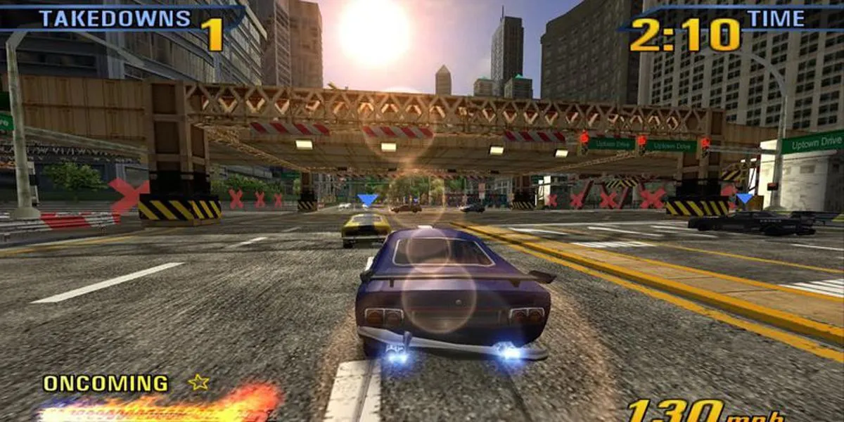 Hiệu ứng cháy nổ ngoạn mục sau một pha Takedown thành công trong Burnout 3, thể hiện sự kịch tính của game.