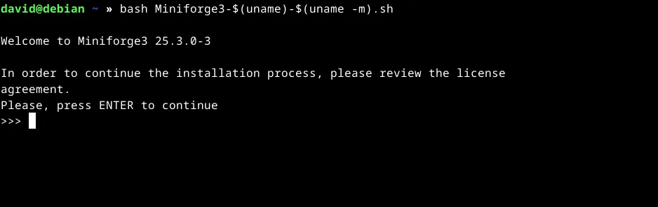 Màn hình của script cài đặt Miniforge Conda đang chờ người dùng nhấn Enter để tiếp tục