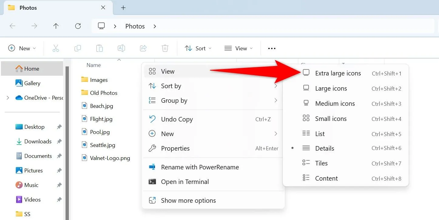 Menu View trong File Explorer hiển thị tùy chọn &quot;Biểu tượng cực lớn&quot; (Extra Large Icons) để xem nội dung ảnh.