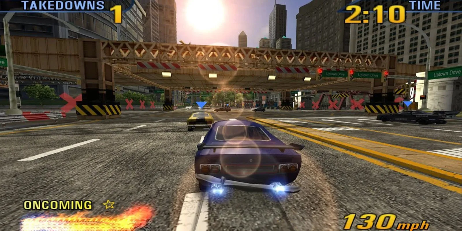 Pha vượt xe và gây va chạm thành công trong Burnout 3, thể hiện cơ chế &quot;Takedown&quot; độc đáo của game.
